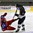 LUCERNE, SWITZERLAND - APRIL 19: Slovakia's Mario Grman #17 knocks down Russia's Denis Guryanov #25 during preliminary round action at the 2015 IIHF Ice Hockey U18 World Championship. (Photo by Matt Zambonin/HHOF-IIHF Images)